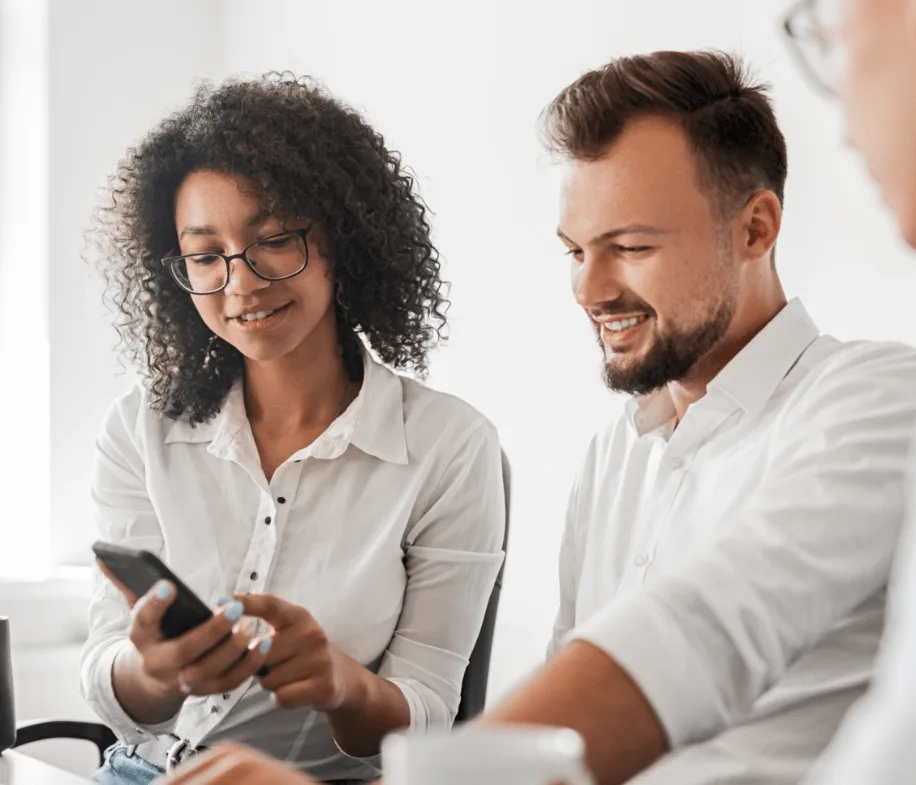 cheerful-black-woman-browsing-smartphone-2023-11-27-05-31-16-utc